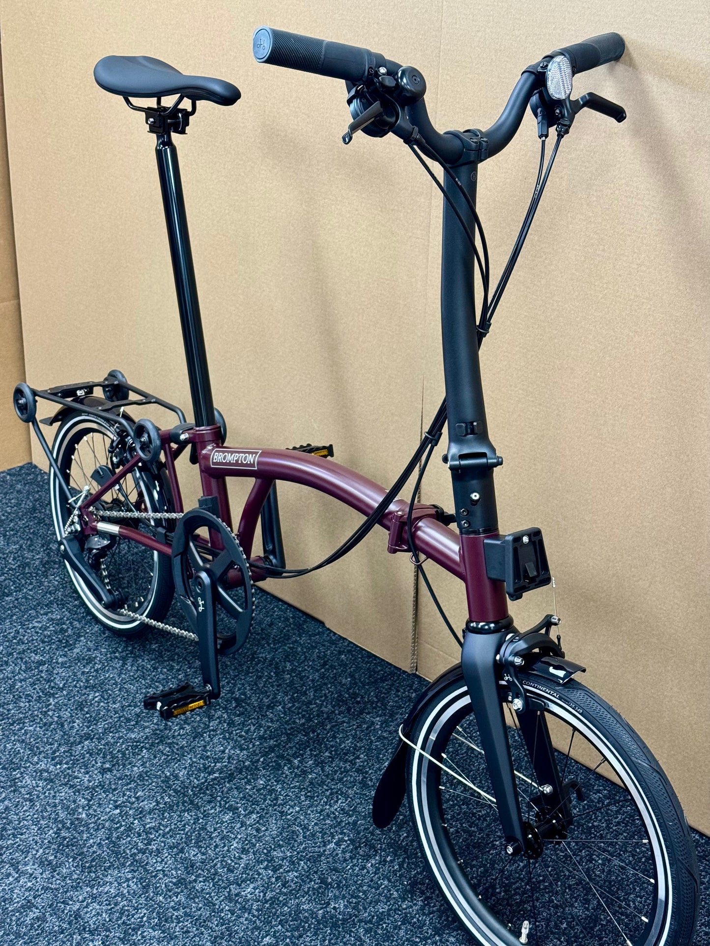 Brompton P Line 12-Speed High-HB Plum Red w/Roller Rack