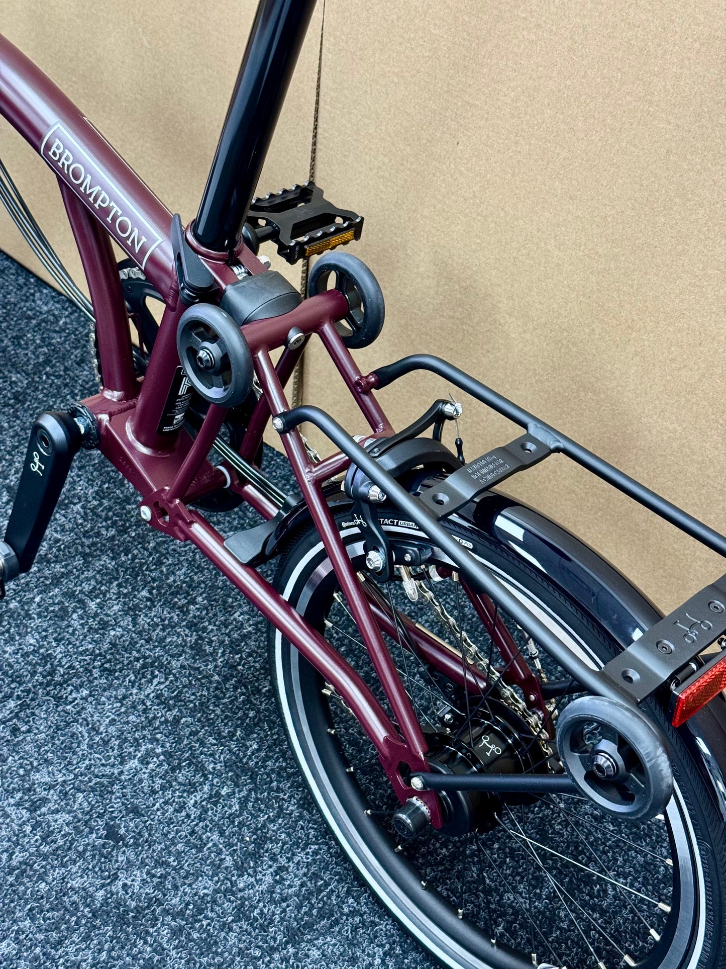Brompton P Line 12-Speed High-HB Plum Red w/Roller Rack