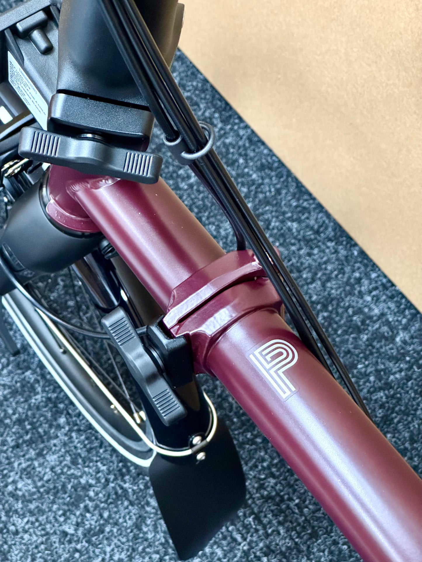 Brompton P Line 12-Speed High-HB Plum Red w/Roller Rack