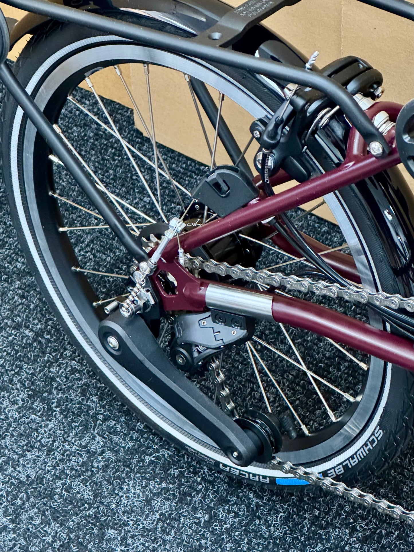 Brompton C Line 12-Speed Mid-HB Plum Red w/Roller Rack