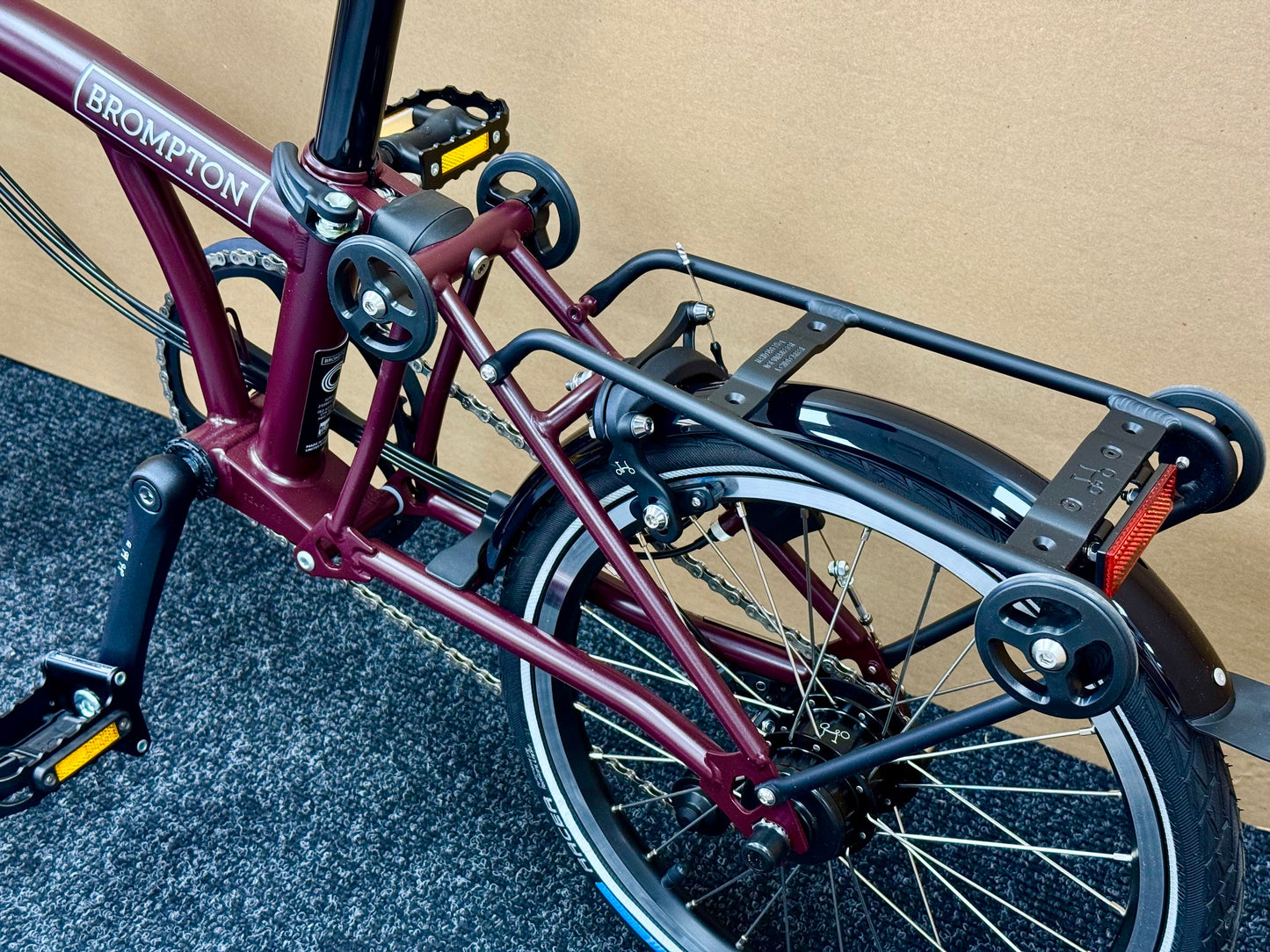 Brompton C Line 12-Speed Mid-HB Plum Red w/Roller Rack