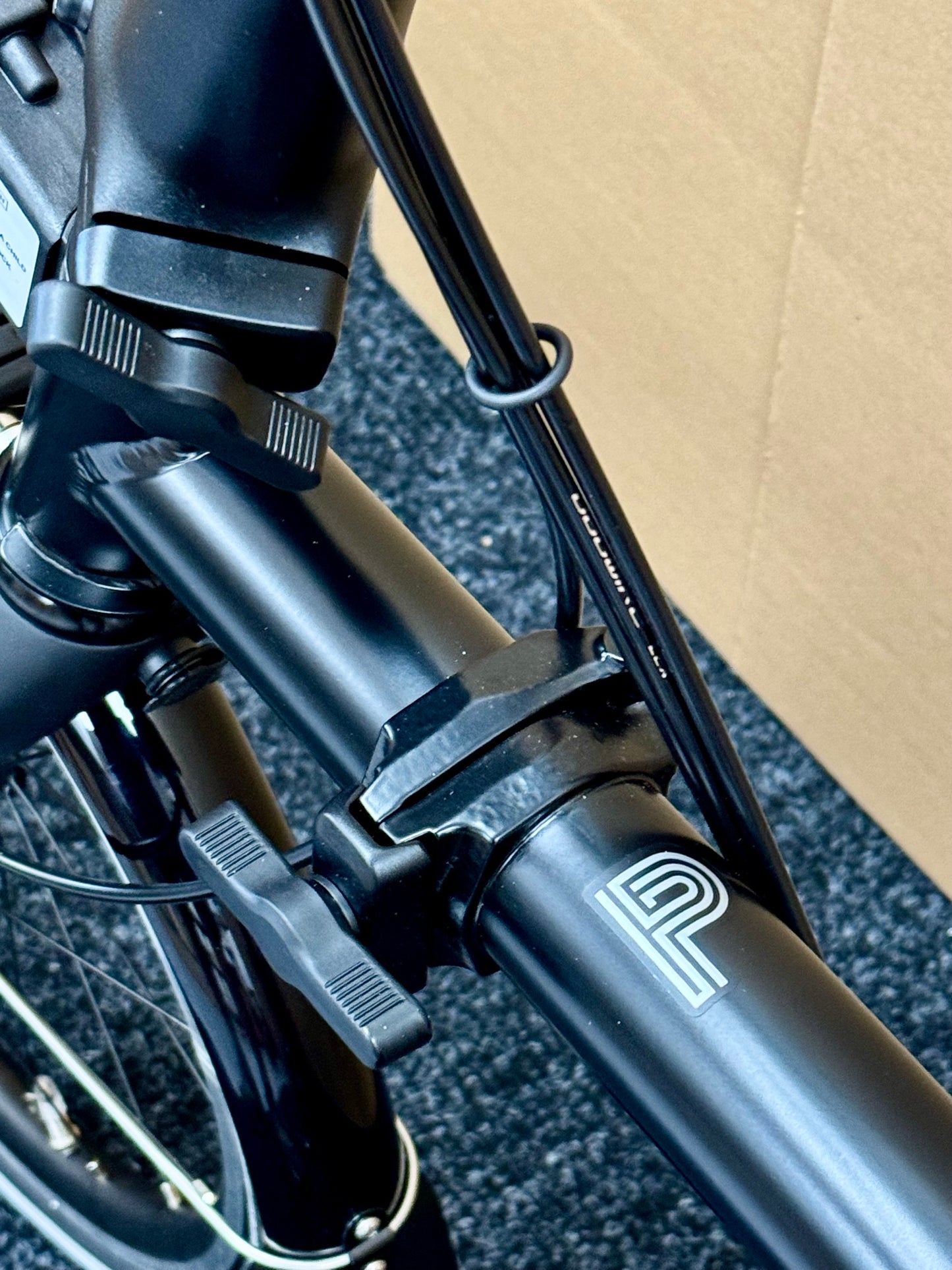 Brompton P Line 12-Speed Mid-HB All Black w/Roller Rack