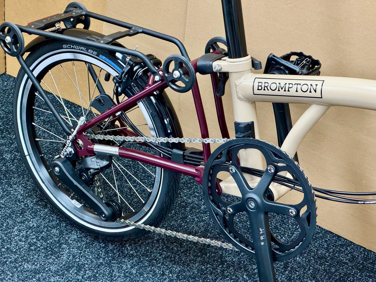 Brompton C Line 12-Speed High-HB Dune/Plum with Roller Rack