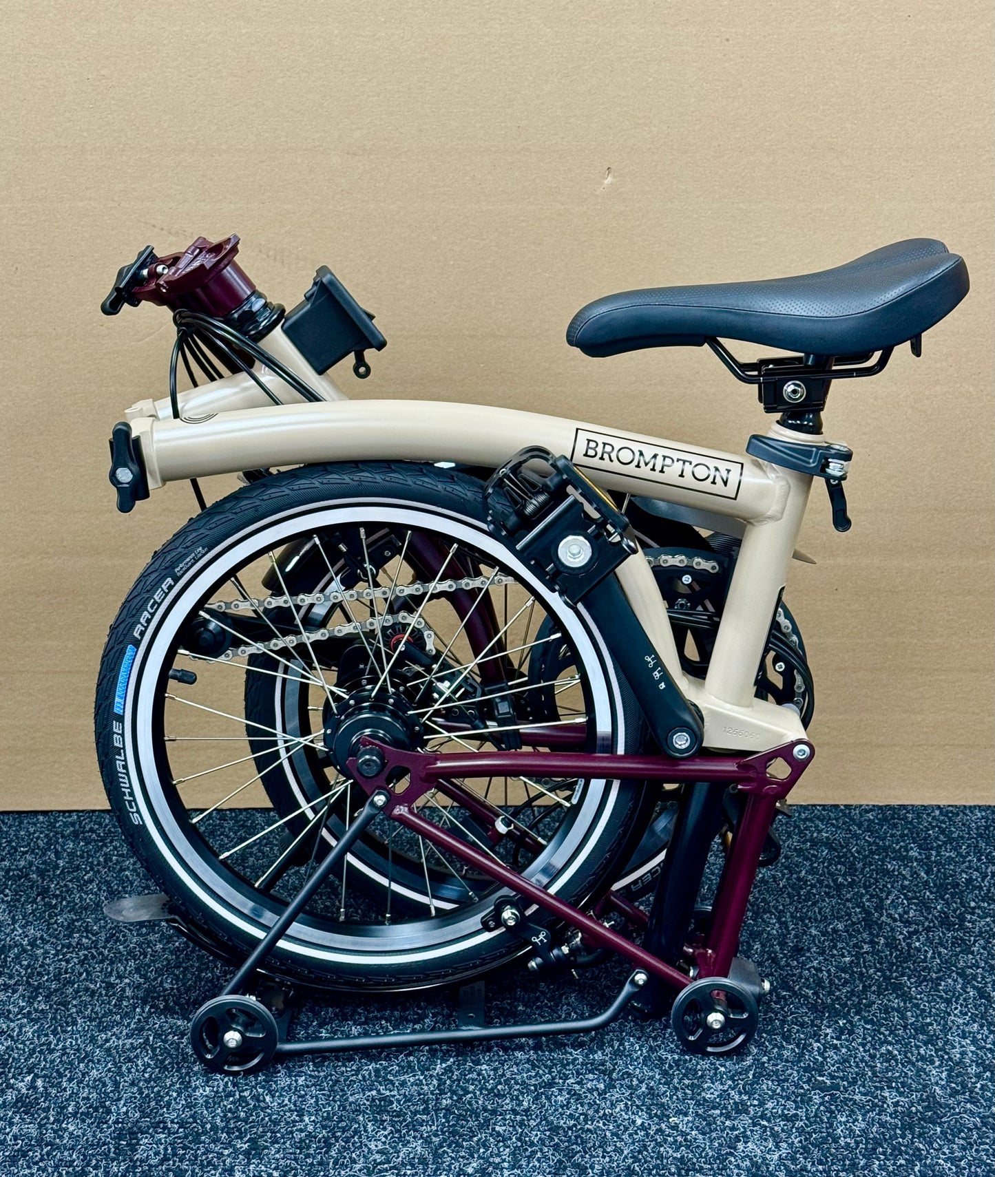 Brompton C Line 12-Speed High-HB Dune/Plum with Roller Rack